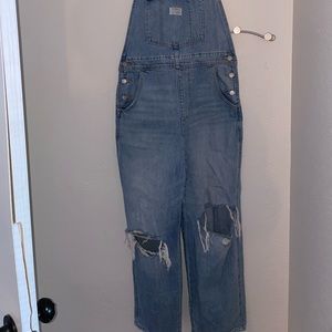 Levi’s distressed ripped overalls